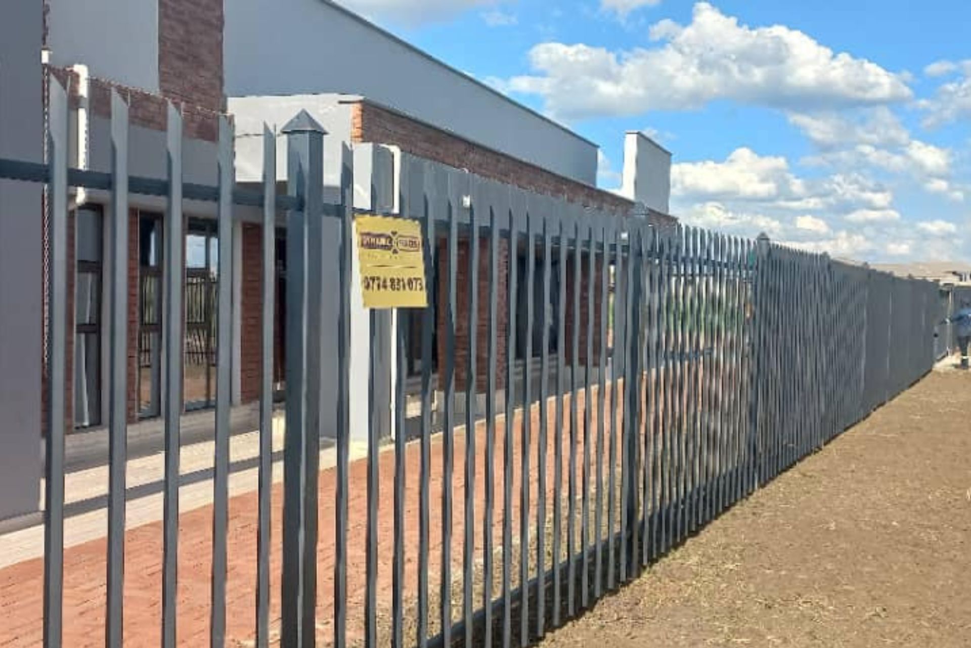 Fine and County — perimeter wall and palisade Mt Pleasant